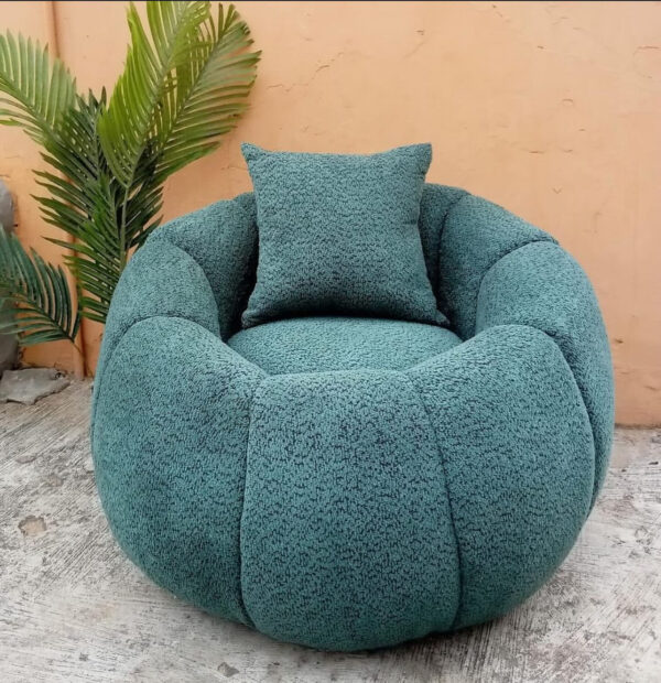 single boucle swivel chair