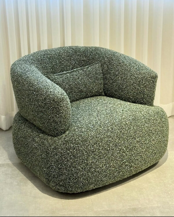 single boucle swivel chair